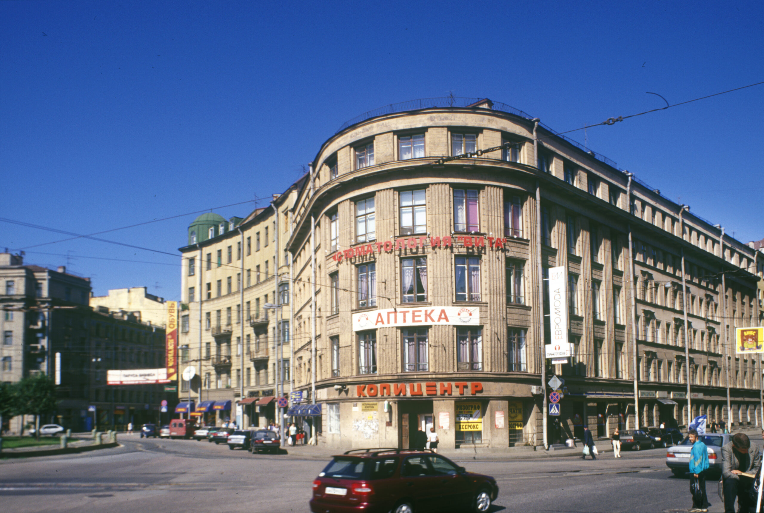 building at a busy intersection